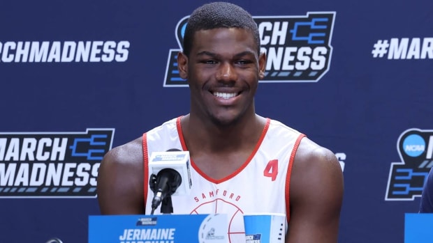 Samford's Jermaine Marshall smiles while speaking with the media